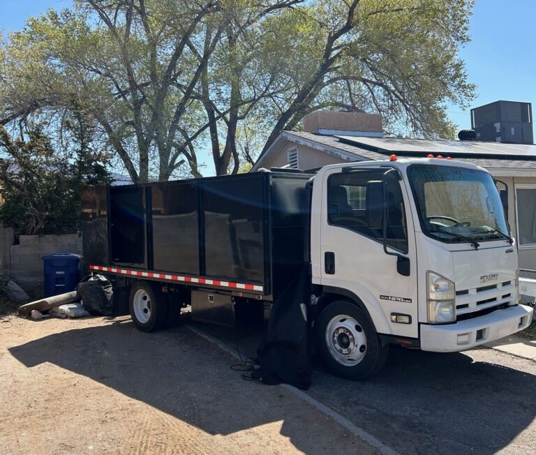a white truck parked in a driveway